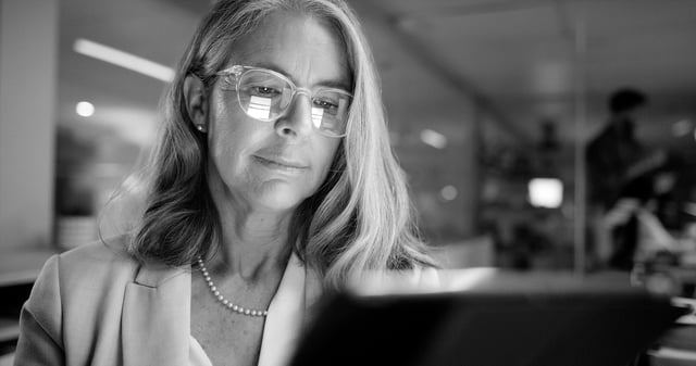 An attorney reviewing case material on a tablet